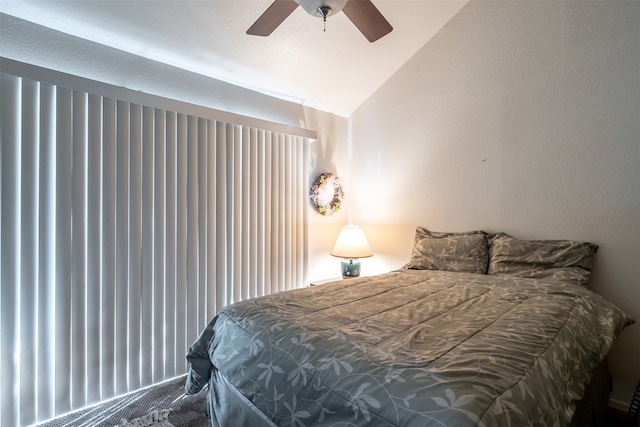 bedroom featuring vaulted ceiling and ceiling fan