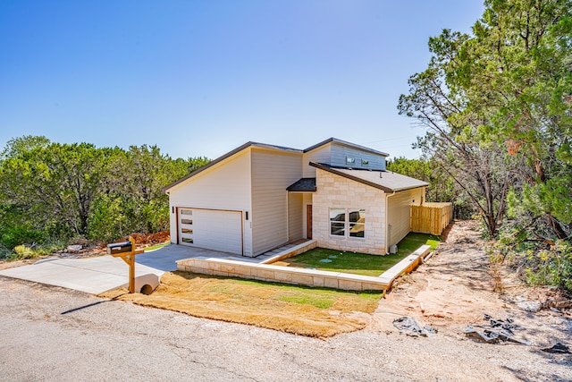 view of front of property featuring a garage