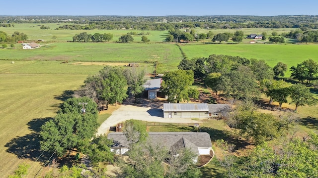 birds eye view of property featuring a rural view