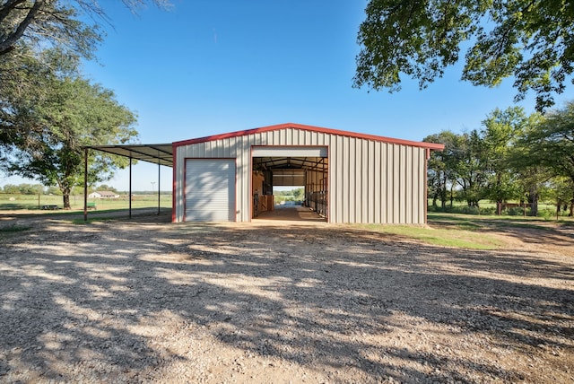 view of outbuilding featuring a garage