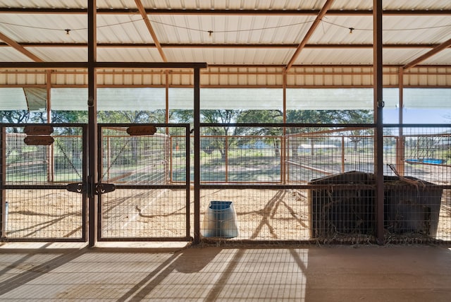 unfurnished sunroom featuring a healthy amount of sunlight