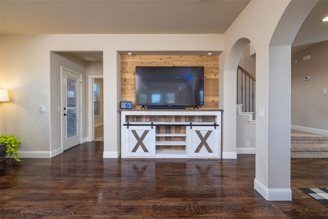 living room with dark hardwood / wood-style floors