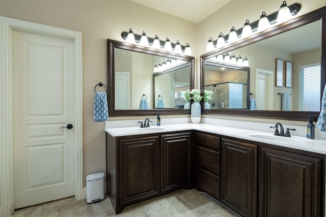 bathroom featuring vanity and a shower