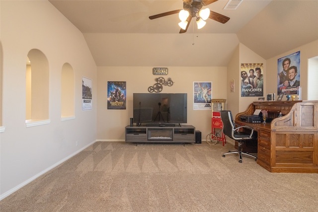 carpeted office space with lofted ceiling and ceiling fan