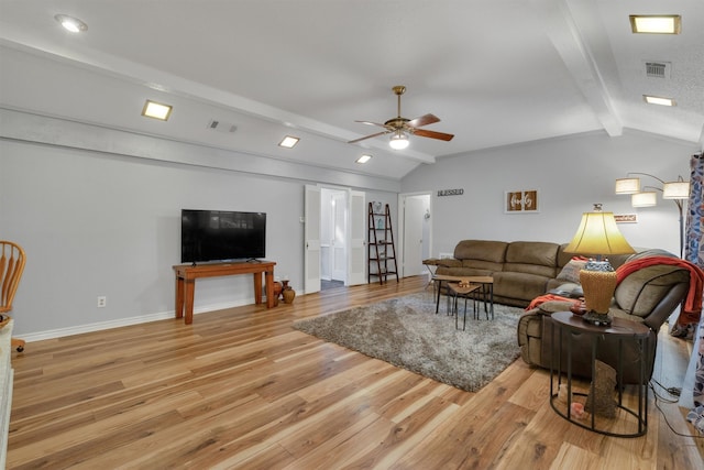 living room featuring ceiling fan, vaulted ceiling with beams, and light wood-type flooring