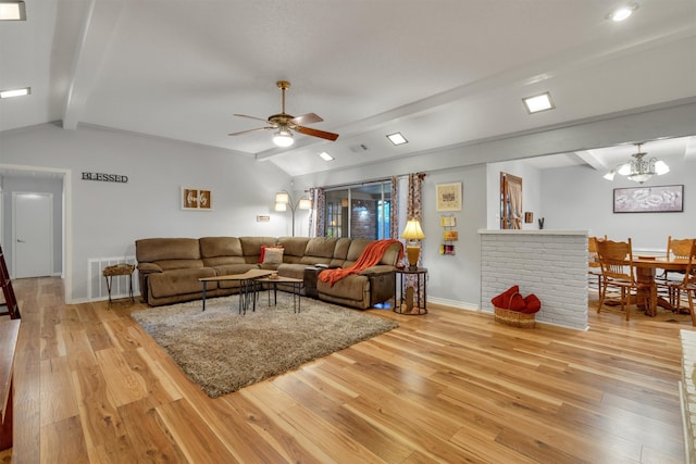 living room featuring light wood-type flooring, ceiling fan with notable chandelier, and lofted ceiling with beams