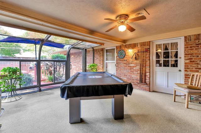 playroom featuring a healthy amount of sunlight, carpet, a textured ceiling, and billiards