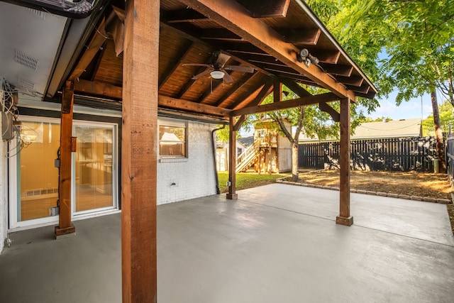 view of patio / terrace featuring a gazebo and ceiling fan