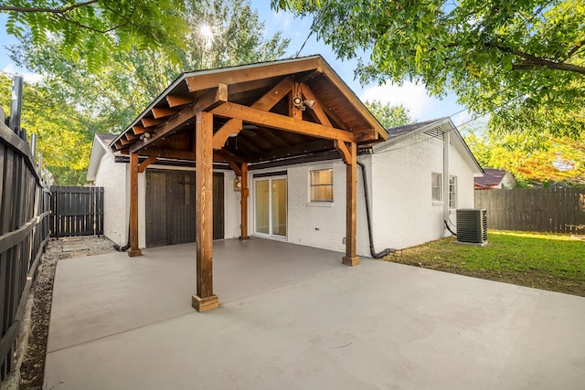 exterior space featuring cooling unit and a patio