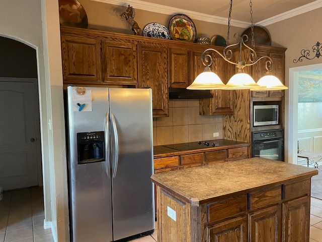 kitchen featuring a kitchen island, pendant lighting, extractor fan, light tile patterned floors, and black appliances