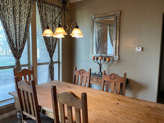 dining area with a notable chandelier