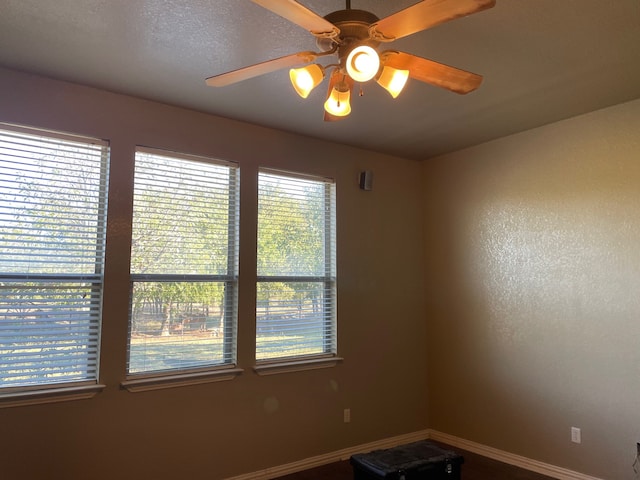 unfurnished room featuring ceiling fan