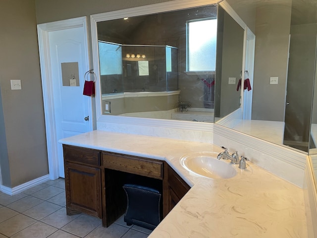 bathroom featuring tile patterned flooring, vanity, and a shower with shower door