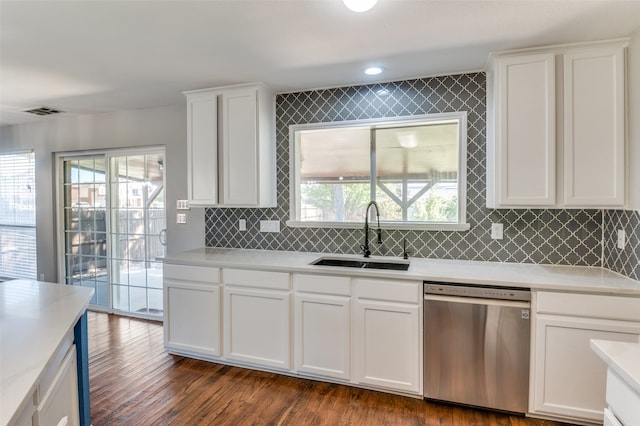 kitchen featuring white cabinetry, dark wood-type flooring, sink, and dishwasher