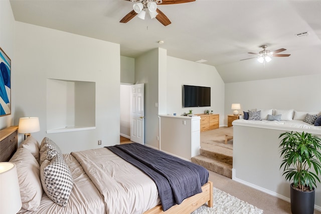 bedroom with lofted ceiling, ceiling fan, and light carpet