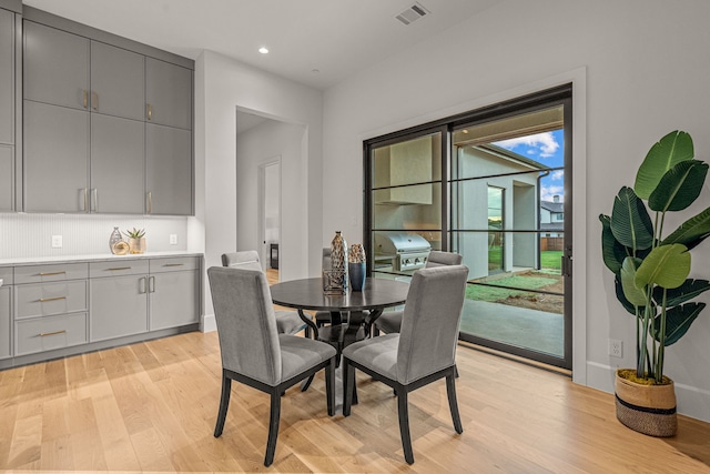 dining area featuring light hardwood / wood-style floors