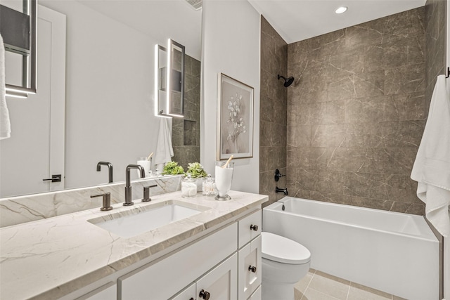bathroom featuring toilet, recessed lighting, tile patterned flooring, vanity, and shower / tub combination