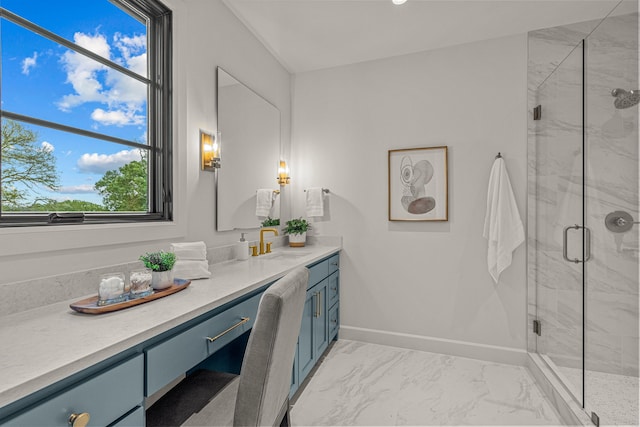 full bath with baseboards, marble finish floor, vanity, and a marble finish shower