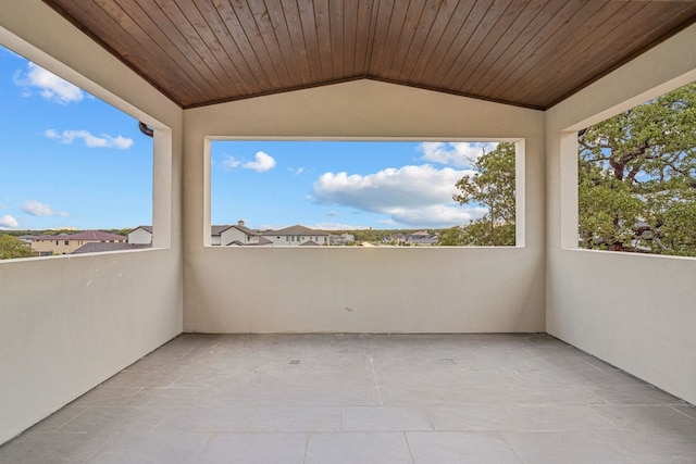 view of patio featuring a balcony