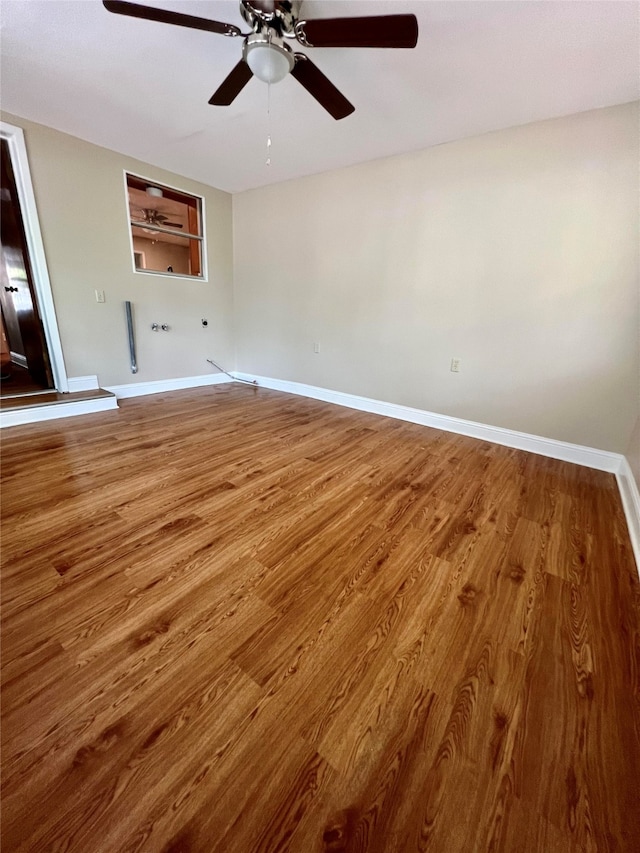 interior space with ceiling fan and hardwood / wood-style flooring