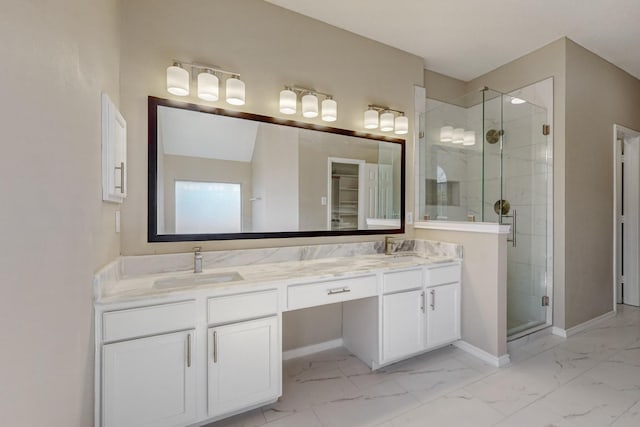 bathroom with a shower with door and vanity