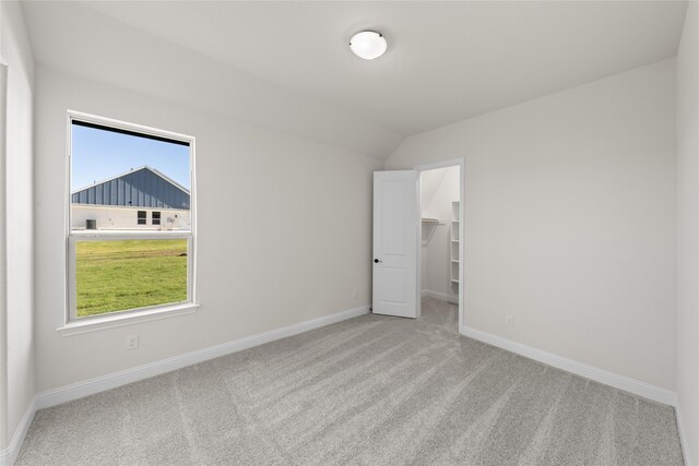 170 Waterview Dr, Gunter, TX 75058 - carpeted spare room featuring vaulted ceiling and baseboards