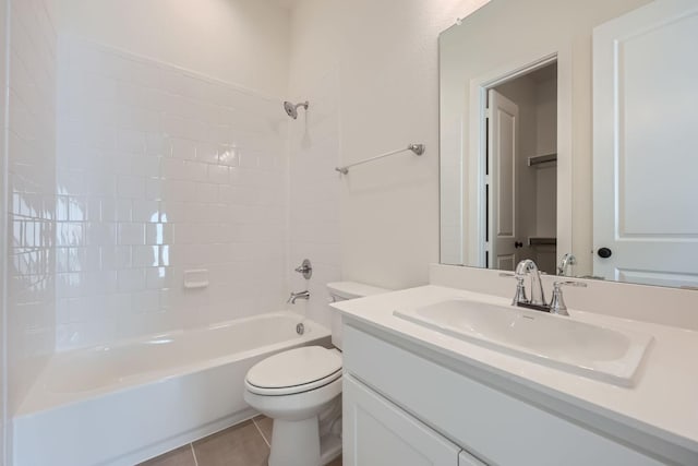 full bathroom with tile patterned flooring, bathtub / shower combination, vanity, and toilet