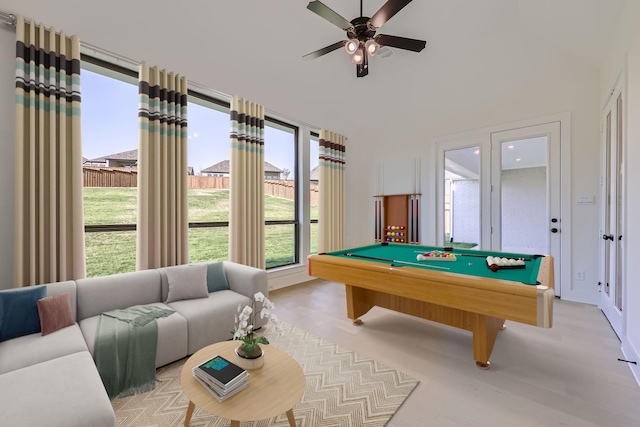 game room with ceiling fan and pool table