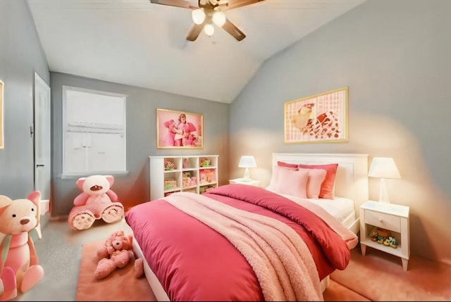 carpeted bedroom featuring lofted ceiling and ceiling fan