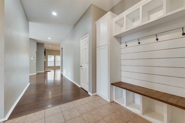 mudroom with light hardwood / wood-style flooring