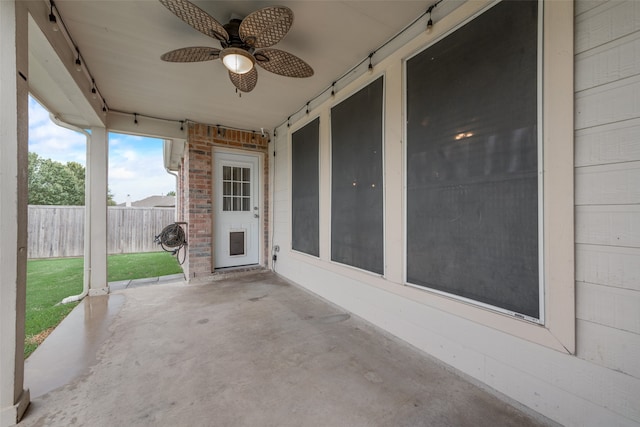 view of patio featuring ceiling fan