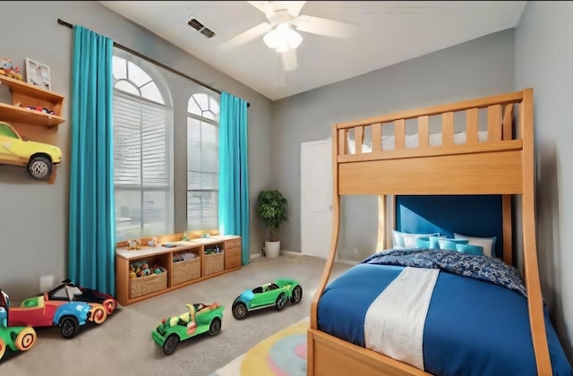 bedroom with ceiling fan and carpet flooring