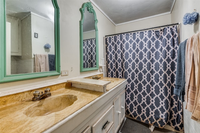 bathroom featuring vanity and crown molding