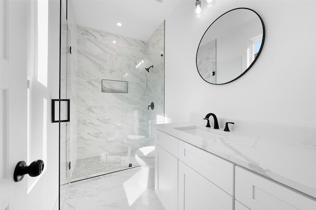 309 W Beckham St W, Sulphur Springs, TX 75482 - full bathroom featuring toilet, a marble finish shower, marble finish floors, vanity, and recessed lighting
