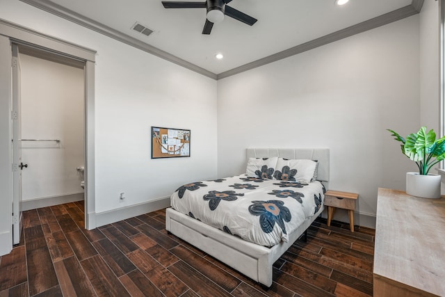 bedroom with ceiling fan, dark wood-type flooring, and crown molding