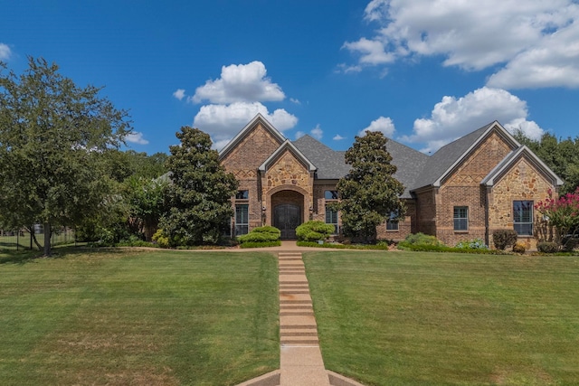 view of front of home with a front yard