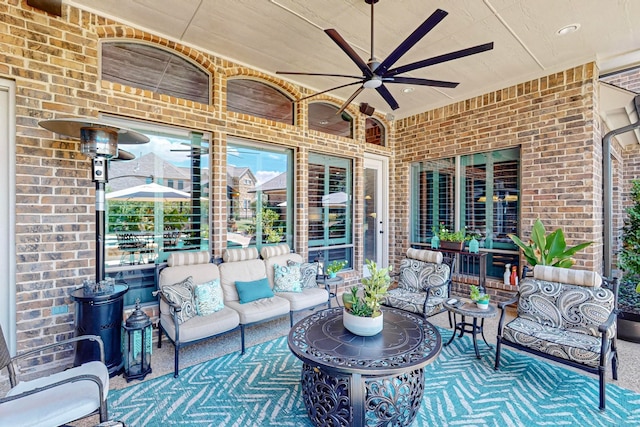 view of patio / terrace featuring ceiling fan and outdoor lounge area