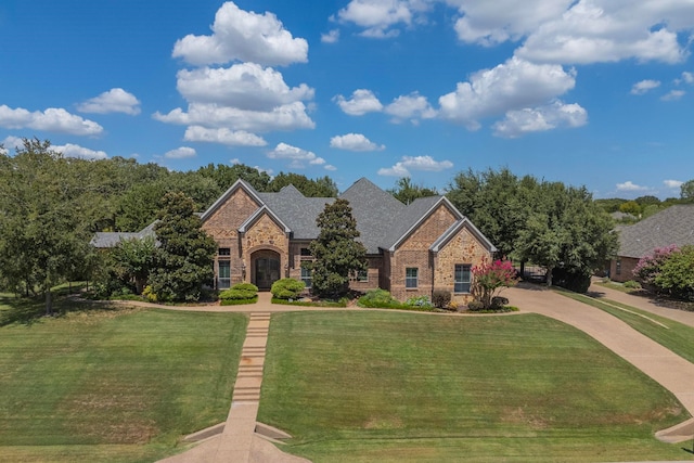 view of front of home with a front yard