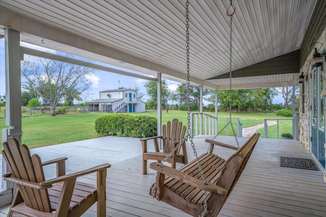 deck featuring a yard