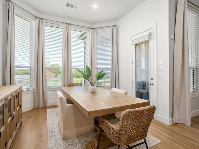 dining room featuring light hardwood / wood-style flooring