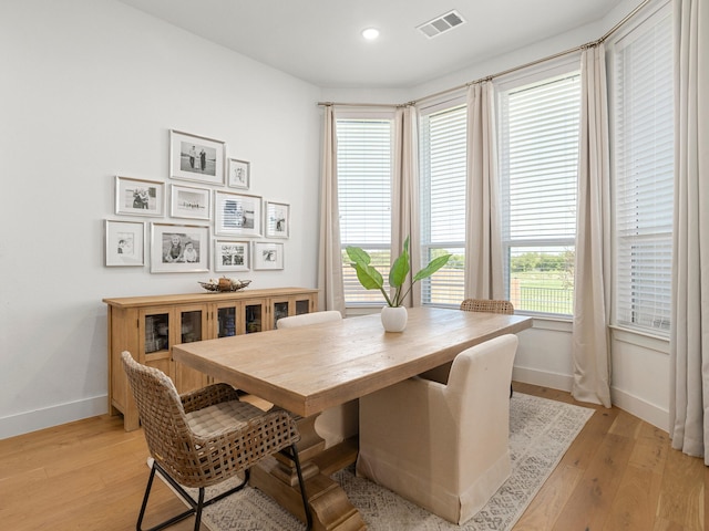 dining room featuring light hardwood / wood-style floors