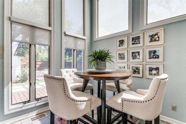 dining room featuring a healthy amount of sunlight