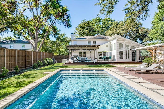 exterior space featuring a pool side deck, an outdoor living space, a pergola, and a patio area