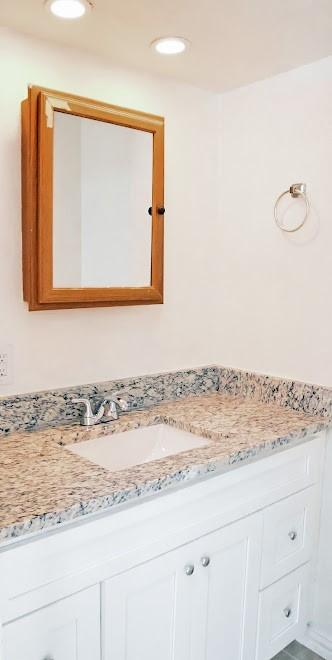 bathroom with a tile shower