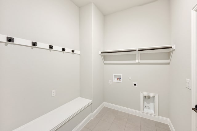 washroom featuring hookup for an electric dryer, washer hookup, and gas dryer hookup