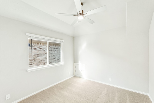 unfurnished room featuring ceiling fan and light colored carpet