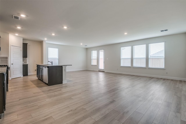 3725 Blooming Prairie Dr, Crandall, TX 75114 - kitchen with visible vents, light wood-type flooring, and open floor plan