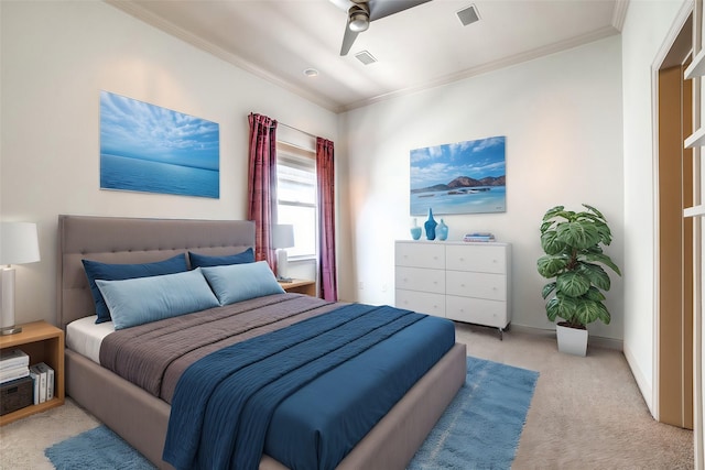 bedroom with light carpet, visible vents, and crown molding