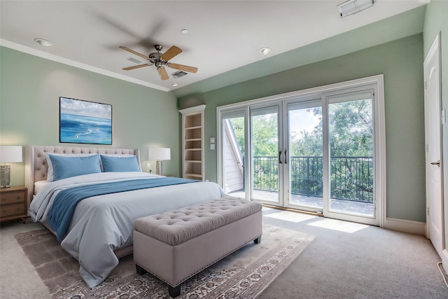 bedroom with carpet floors, access to exterior, visible vents, and ornamental molding