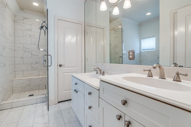 bathroom featuring walk in shower, vanity, and crown molding